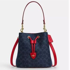 NWT Coach outlet item Rowan Bucket Bag In Signature Canvas (Blue/Red) CBH07